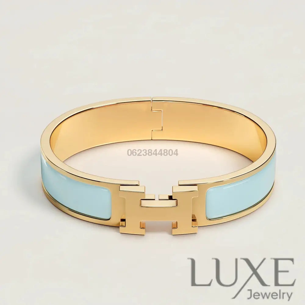 BRACELET Hermès Bleu ciel or Bracelet