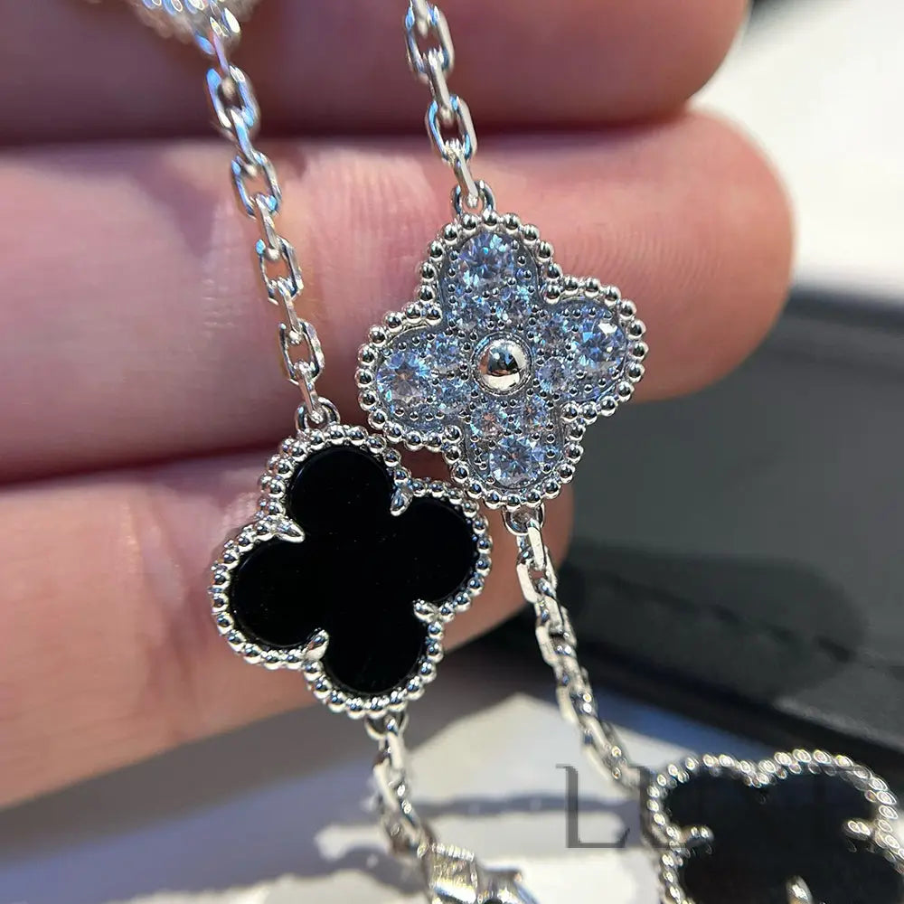 CLOVER 5 MOTIF ONYXS DIAMOND BRACELET SILVER Silver Bracelets