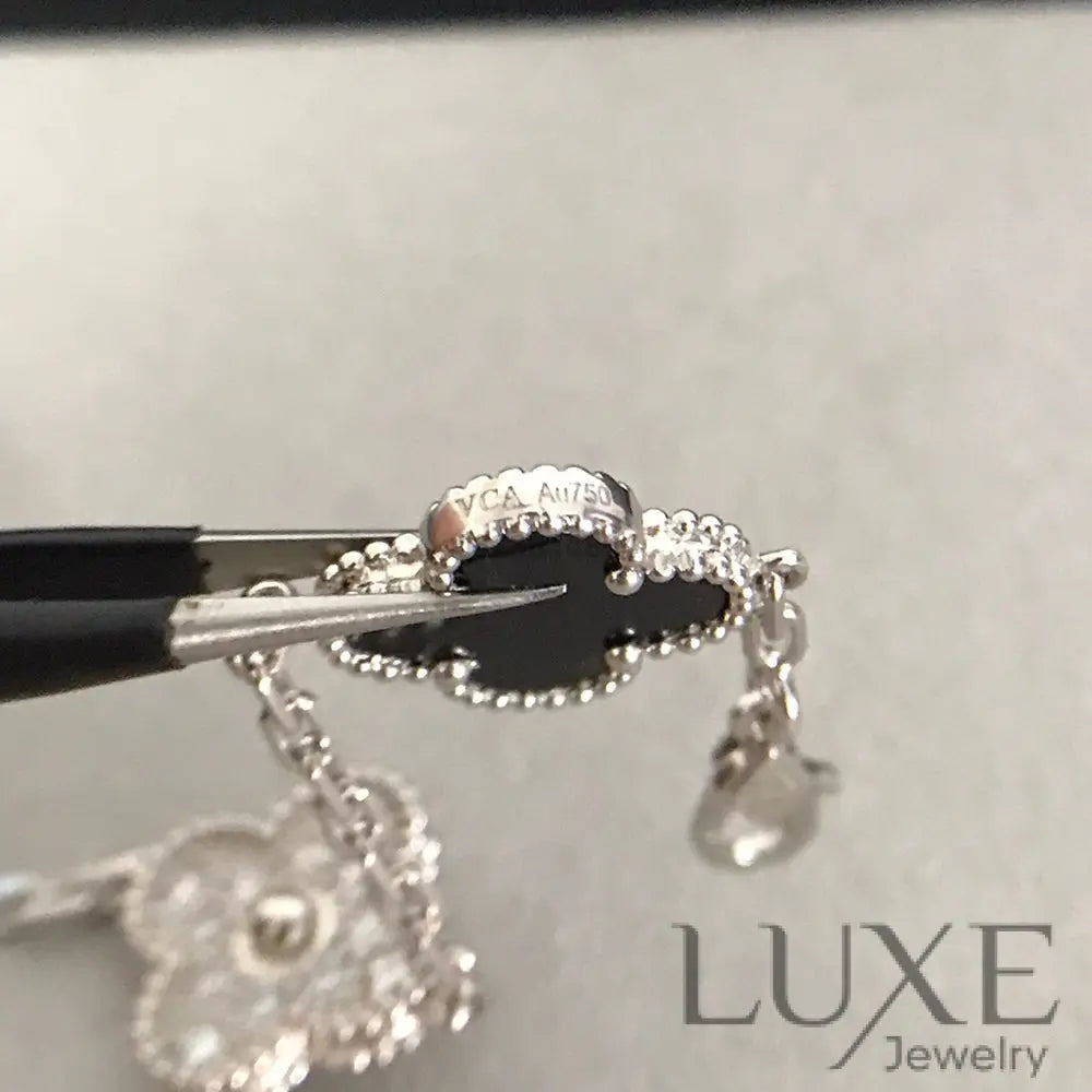 CLOVER 5 MOTIF ONYXS DIAMOND BRACELET SILVER Silver Bracelets
