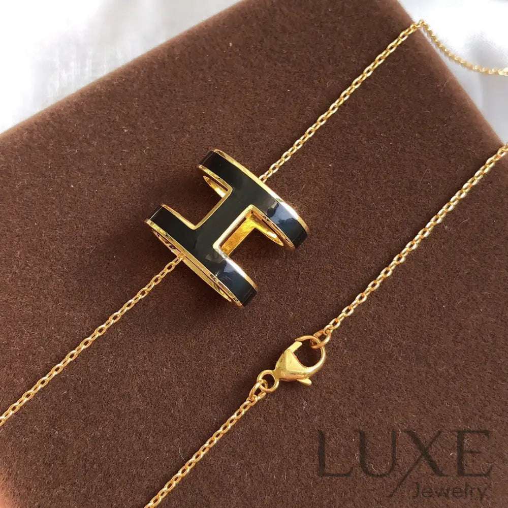 Collier Owatch ™️ HM CLIC RED ENAMEL GOLD NECKLACEHM CLIC BLACK ENAMEL GOLD NECKLACE Gold Necklaces