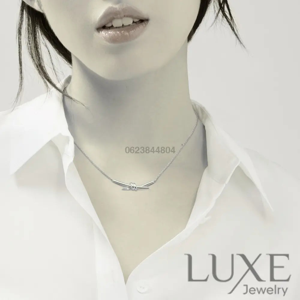 COLLIER TIFFANY & CO KNOT PENDENTIF WHITE GOLD bague
