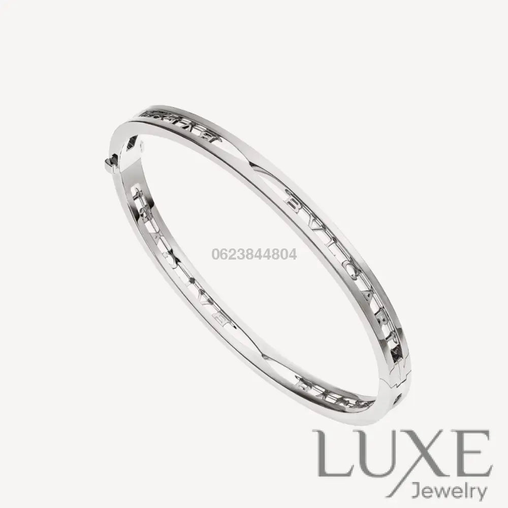 OWATCH™️ZERO 1 SPIRAL LOGO SILVER BRACELET Silver Bracelets